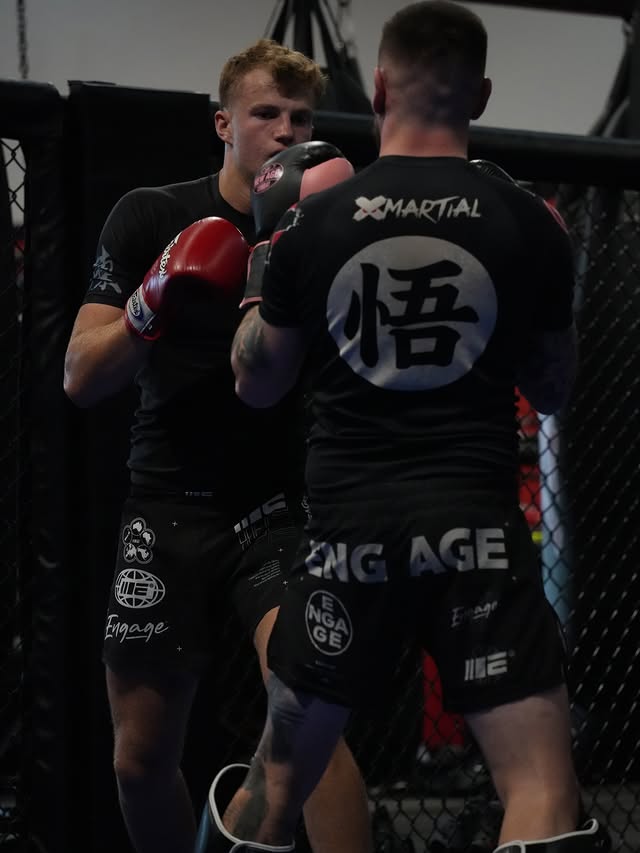 Hard sparring rounds inside the cage